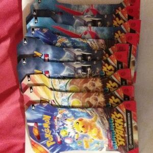 Pokemon scarlet and violet surging Sparks lot of 9 booster packs with sleeves